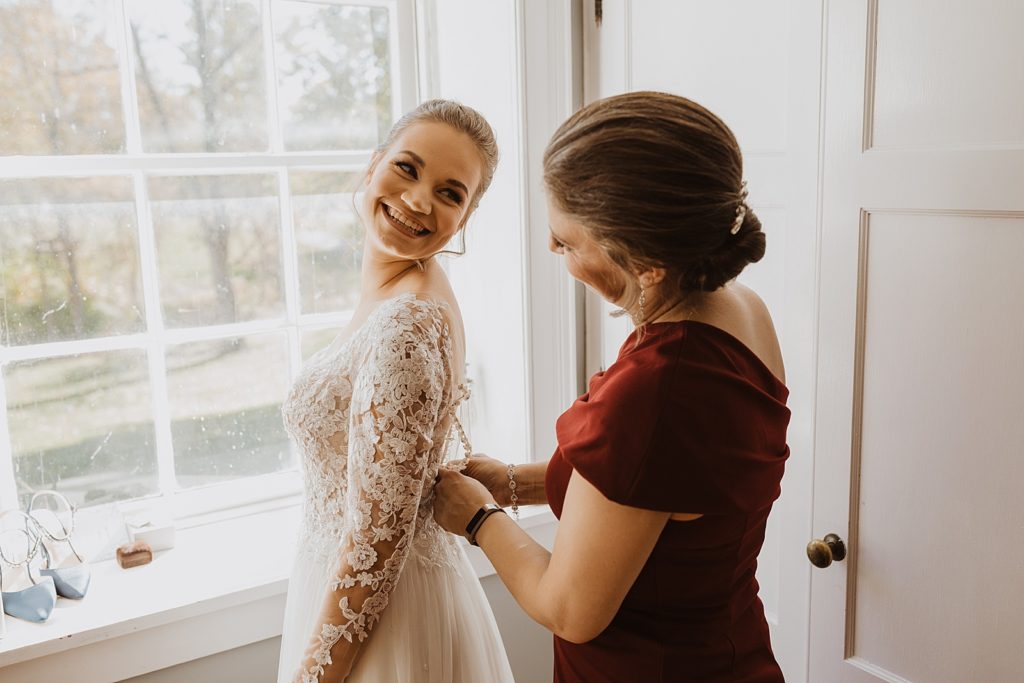Bride and Mom Getting Ready on Wedding Day
