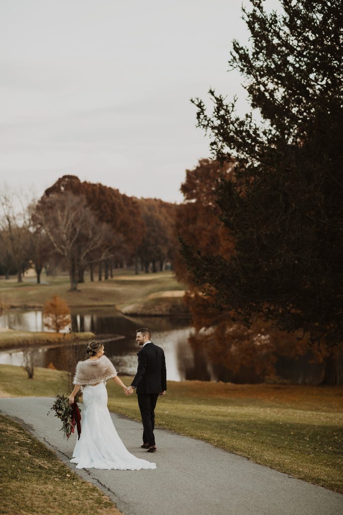 Bogey Hills Country Club in St Charles | Bride and Groom Holding Hands