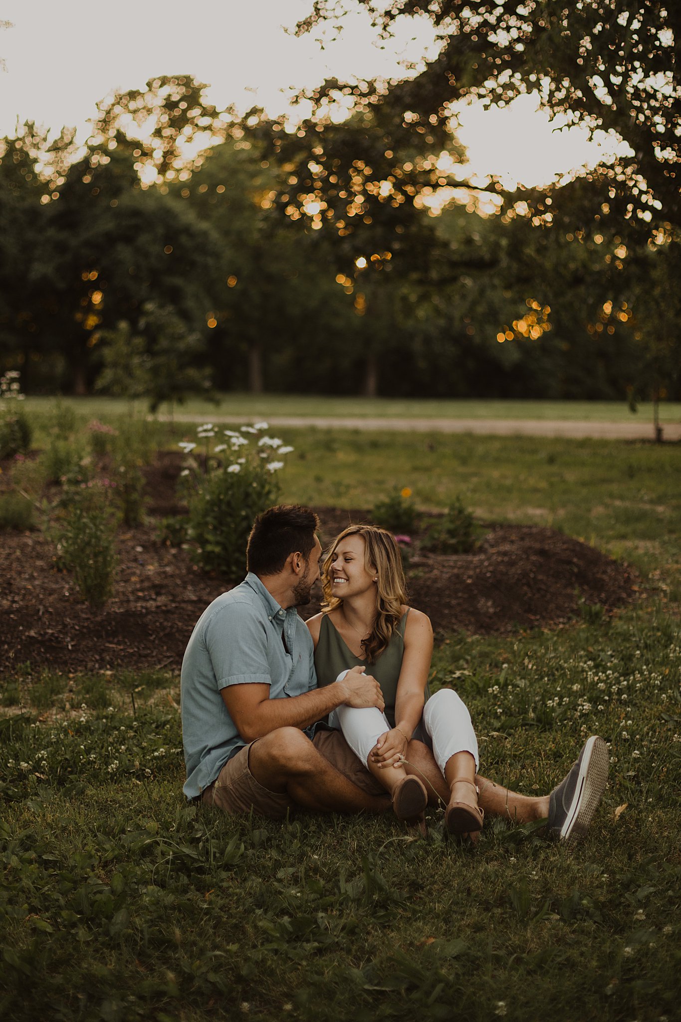 Lafayette Square Engagement Photos | Couple sitting on the grass together