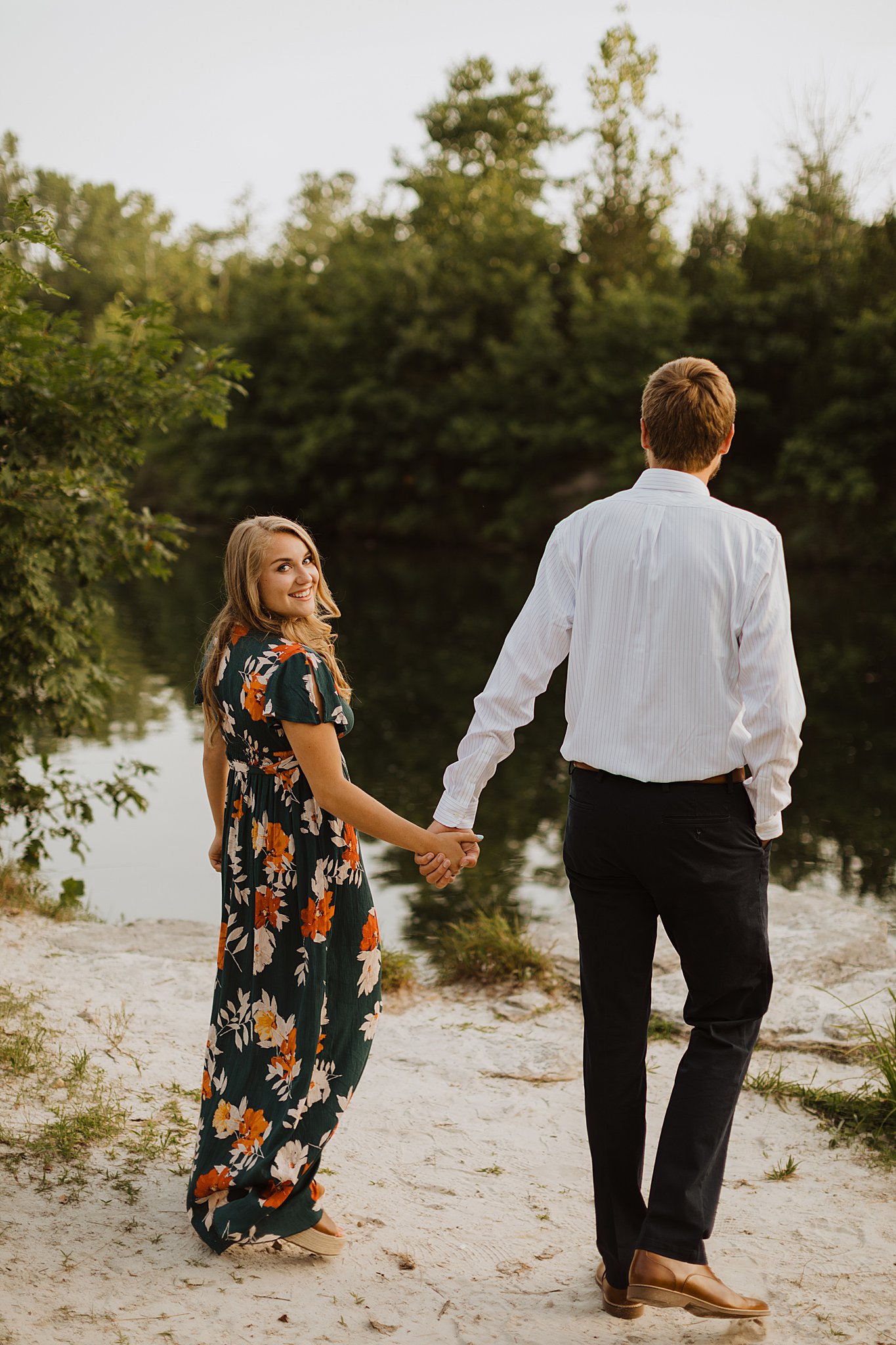 Klondike Park Engagement Photos | Couple walking and holding hands