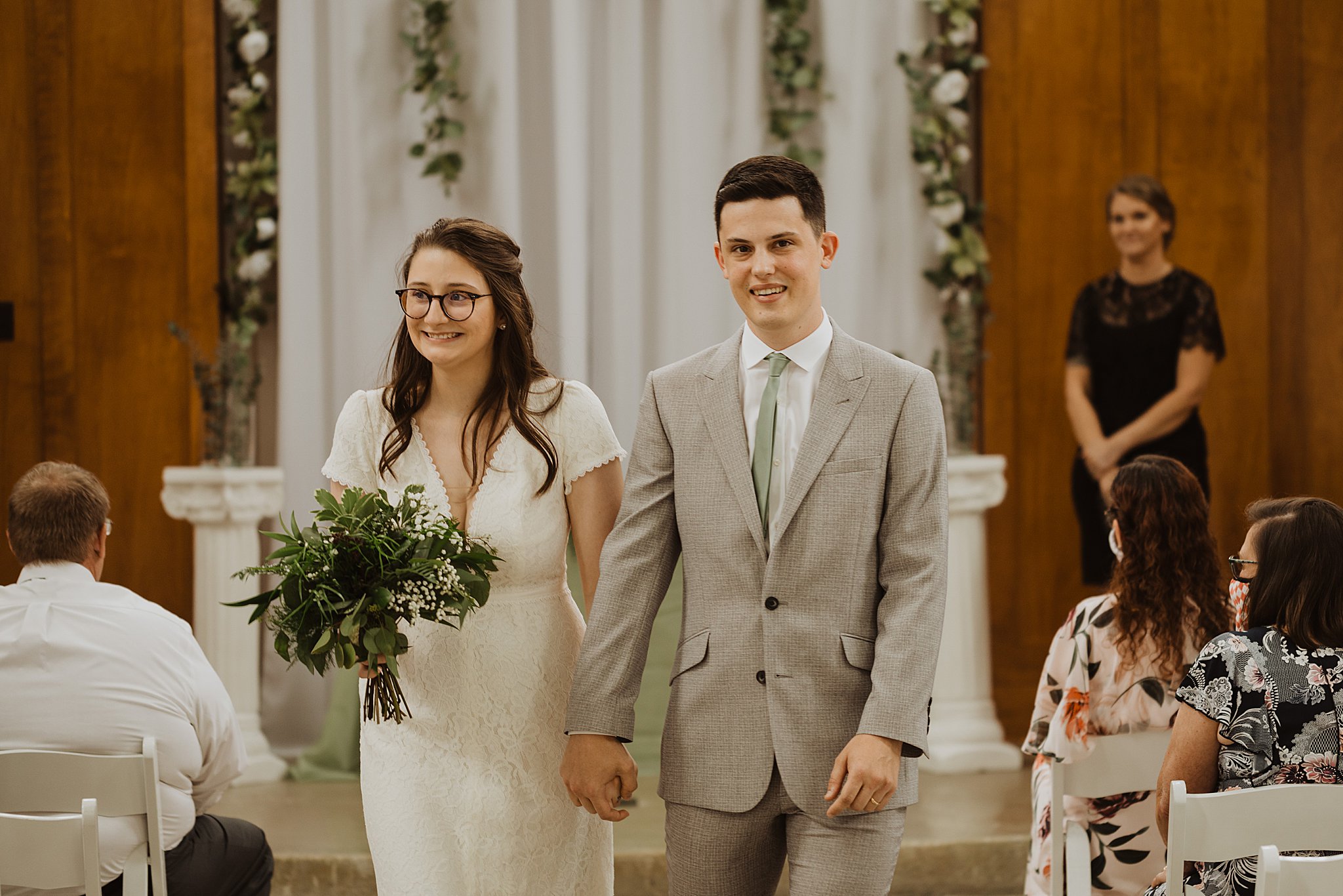 Bride and Groom Walking Down the Aisle | New Town Chapel