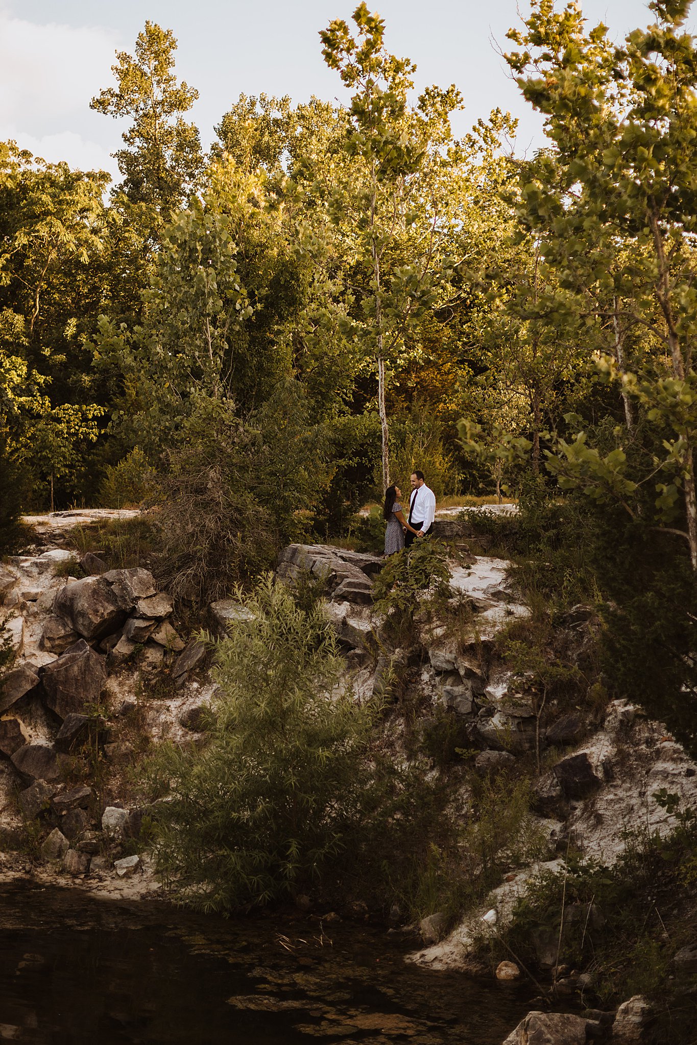 Klondike Park Engagement Photos | Couple standing near cliff