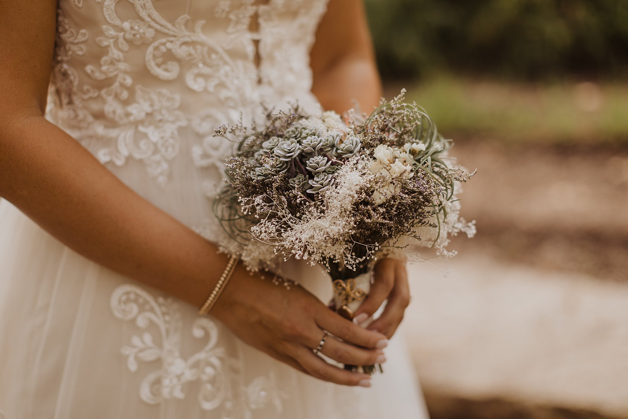 Bride with beautiful dried bouquet