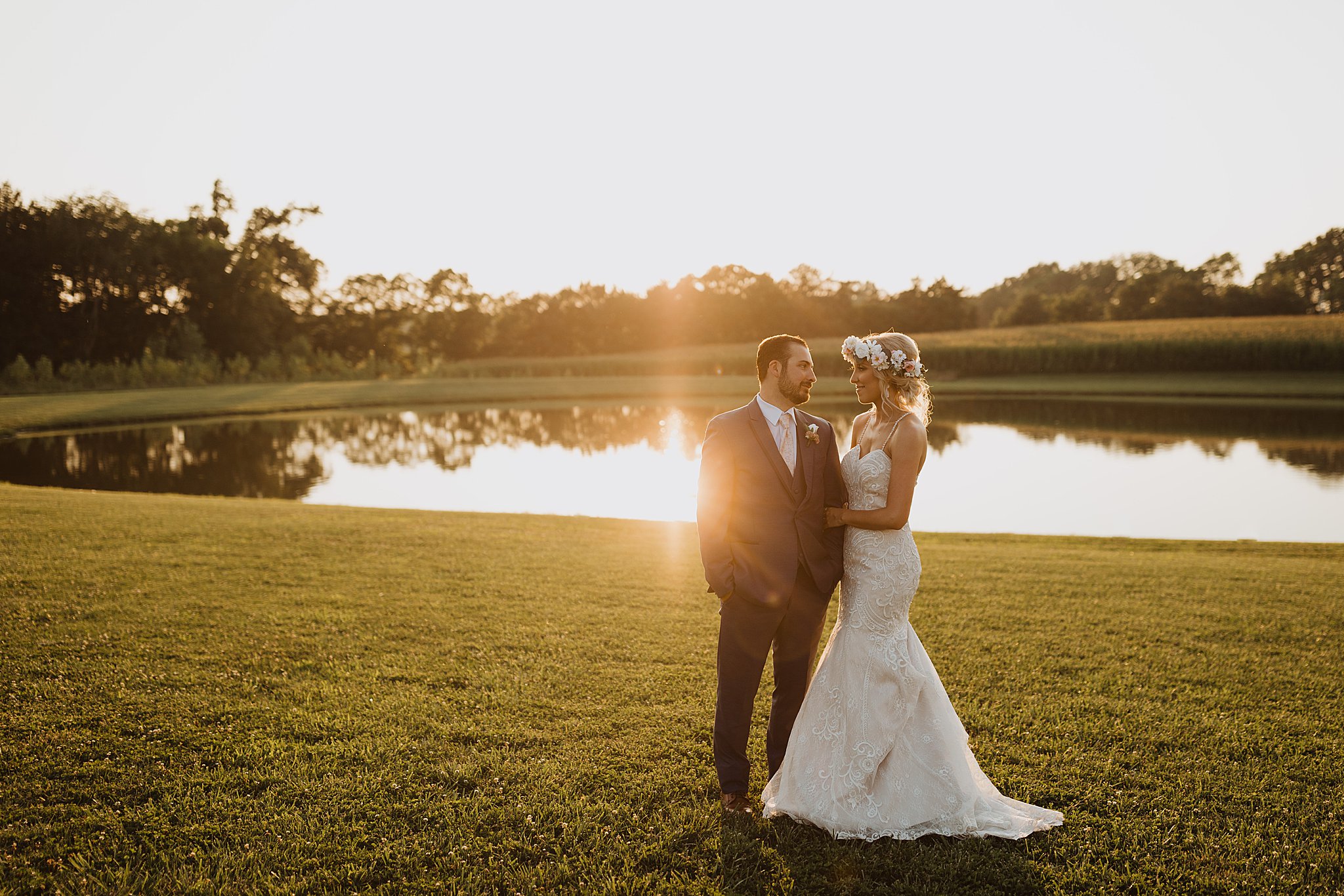 Bride and Groom at Sunset in front of Pond