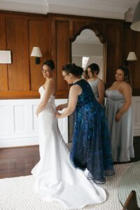 Romantic rainy day portrait of Isabella and Joseph during their St. Louis Art Museum wedding captured by a St. Louis wedding photographer.