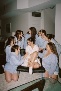 Romantic rainy day portrait of Isabella and Joseph during their St. Louis Art Museum wedding captured by a St. Louis wedding photographer.