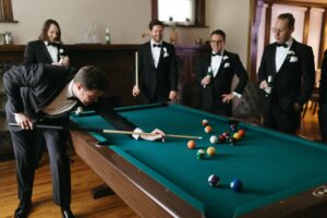 Romantic rainy day portrait of Isabella and Joseph during their St. Louis Art Museum wedding captured by a St. Louis wedding photographer.