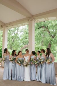 Wedding portraits at the Muny in Forest Park before a St. Louis Art Museum wedding on a rainy day.
