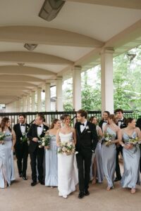 Wedding portraits at the Muny in Forest Park before a St. Louis Art Museum wedding on a rainy day.