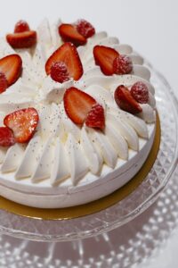 Elegant wedding reception inside the St. Louis Art Museum main hall with pastel floral arrangements and grand architecture.