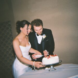 Elegant wedding reception inside the St. Louis Art Museum main hall with pastel floral arrangements and grand architecture.