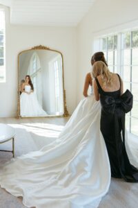 Bride getting ready for elegant black and white Westwind Hills wedding in St Louis