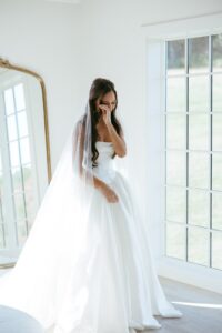 emotional first look between bride and father during wedding day at Westwind Hills