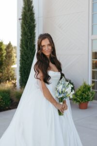 bride holding calla lilies at Westwind Hills wedding