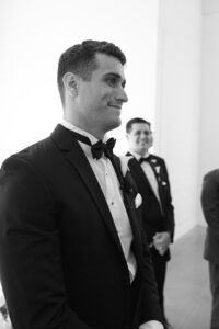 emotional indoor wedding ceremony in the chandelier room at Westwind Hills in St Louis