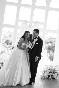 emotional indoor wedding ceremony in the chandelier room at Westwind Hills in St Louis